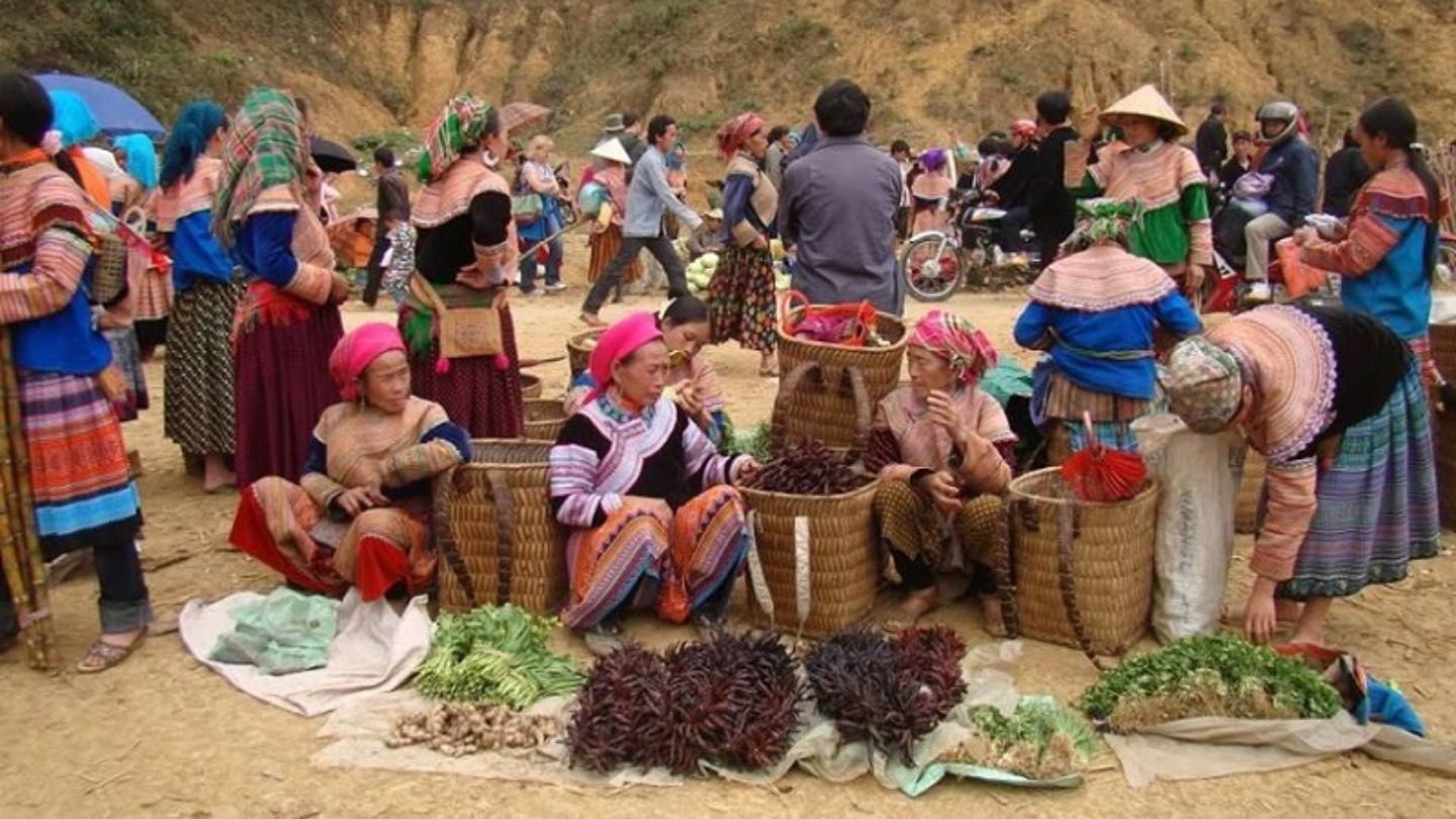 Dong Van Market bustling with colorful handicrafts and food